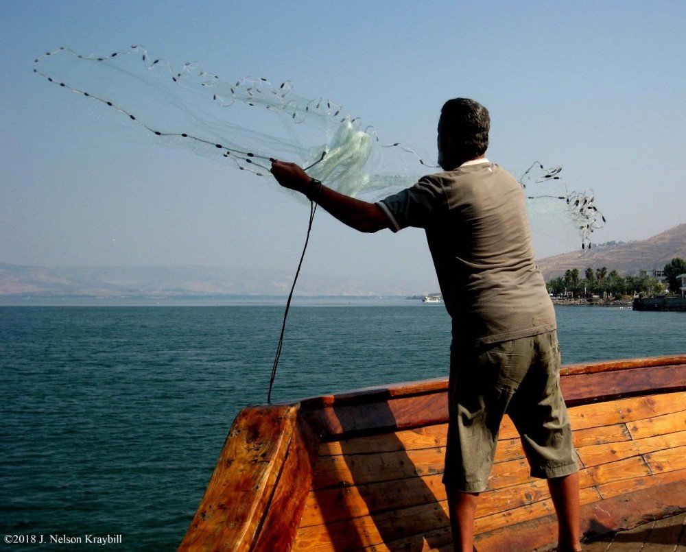 casting net on Sea of Galilee